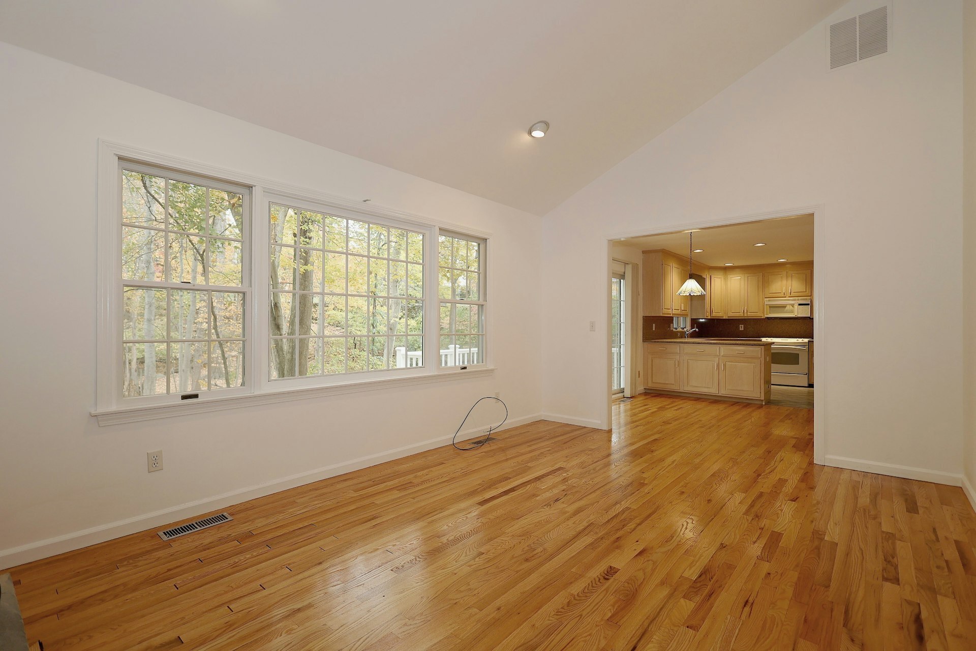 44 Deer Run Road Fairfield, CT 06824 - Photo 32 of 40 an empty room with wooden floor and windows