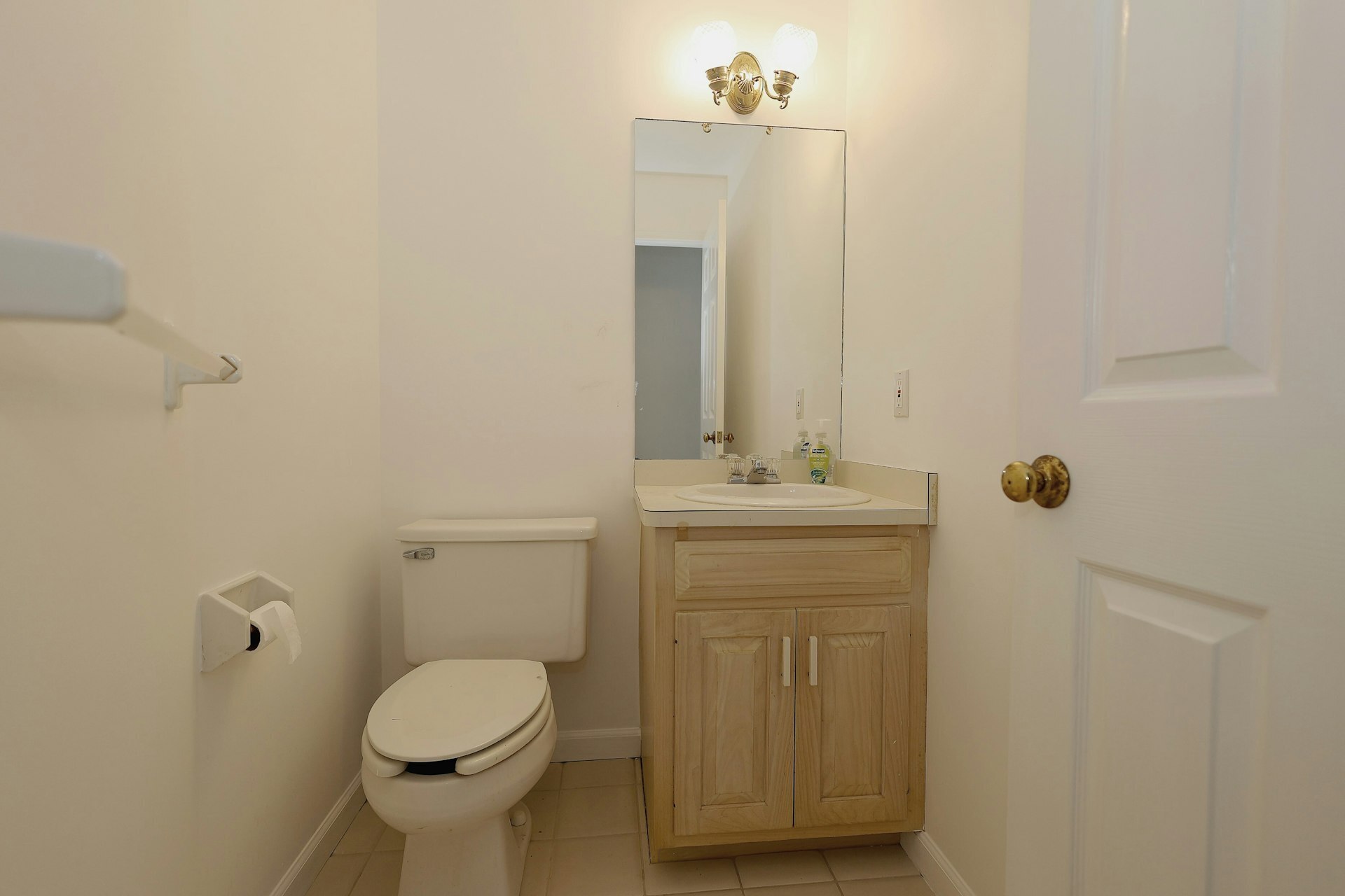 44 Deer Run Road Fairfield, CT 06824 - Photo 7 of 40 a bathroom with a toilet sink and mirror