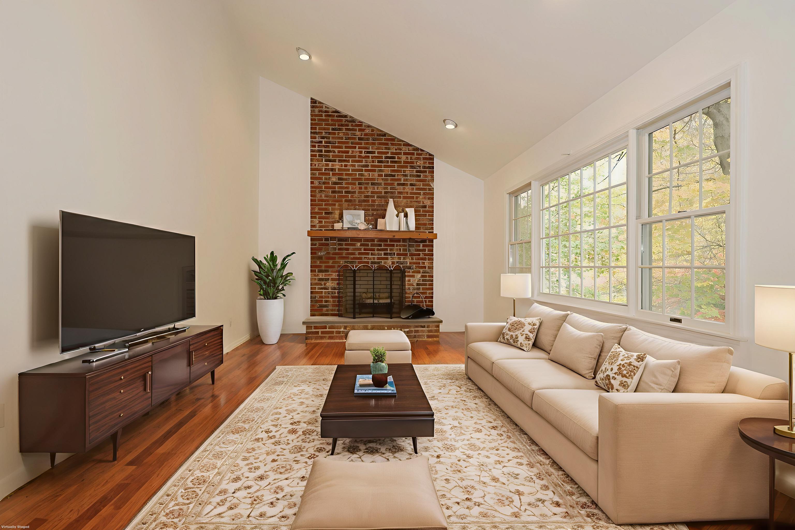 44 Deer Run Road Fairfield, CT 06824 - Photo 8 of 40 a living room with furniture and a flat screen tv