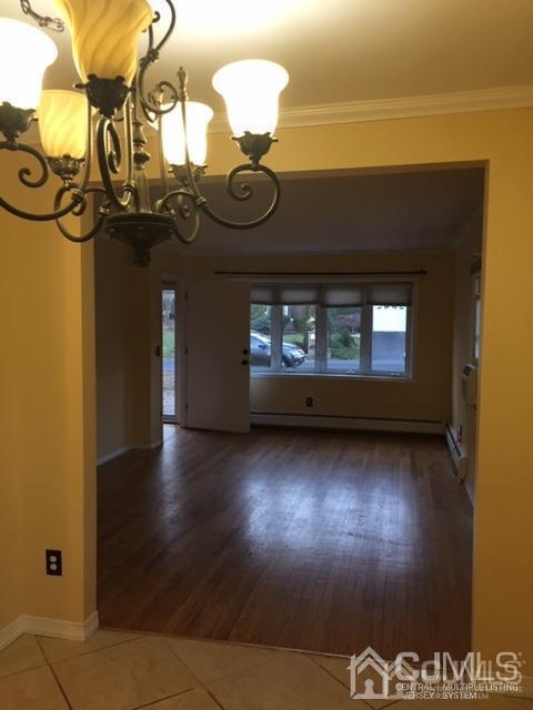 65 Tower Road Edison, NJ 08820 - Photo 11 of 14 a view of a fireplace in a room