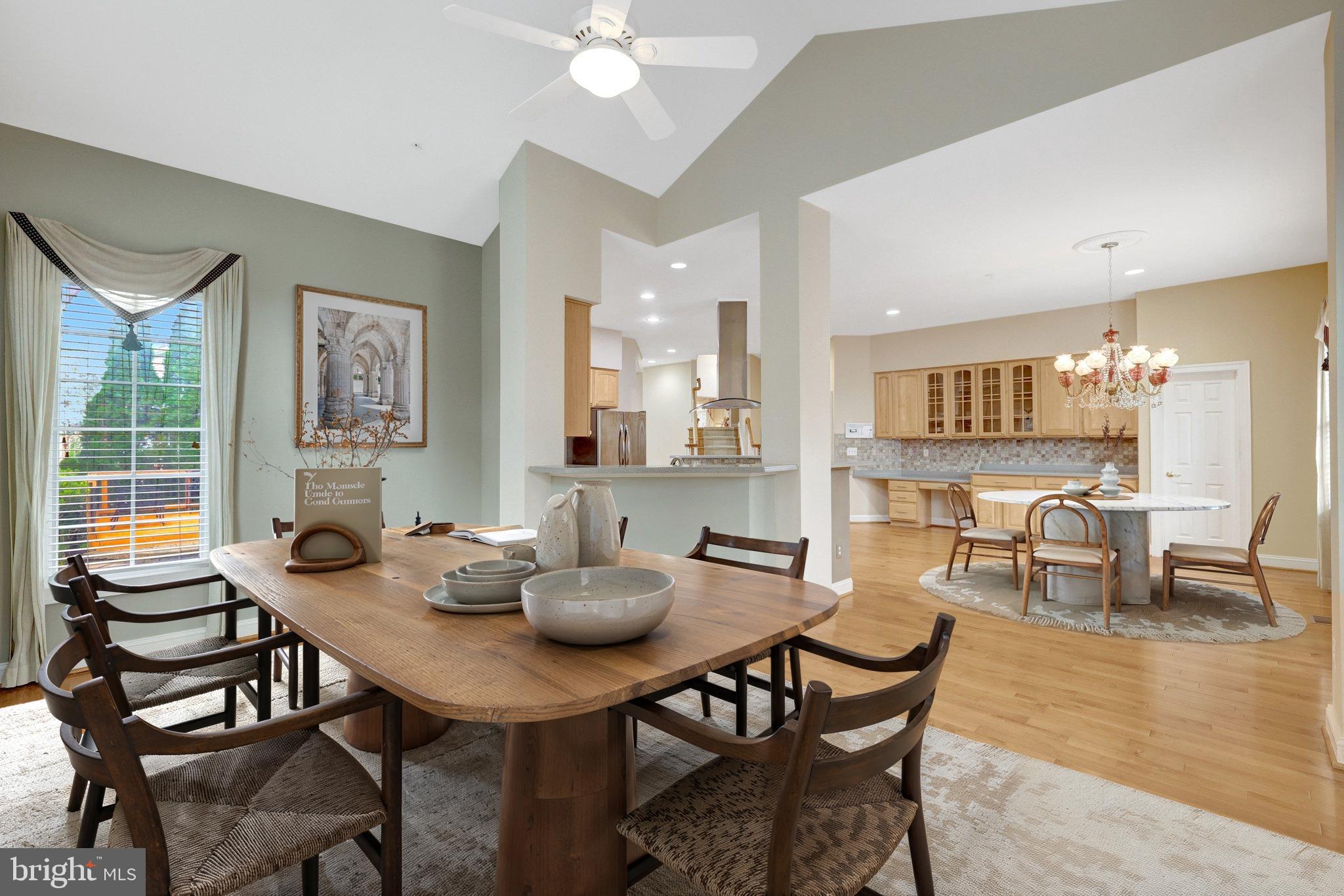 20443 Cliftons Point Street Sterling, VA 20165 - Photo 25 of 37 a view of a dining room with furniture and wooden floor
