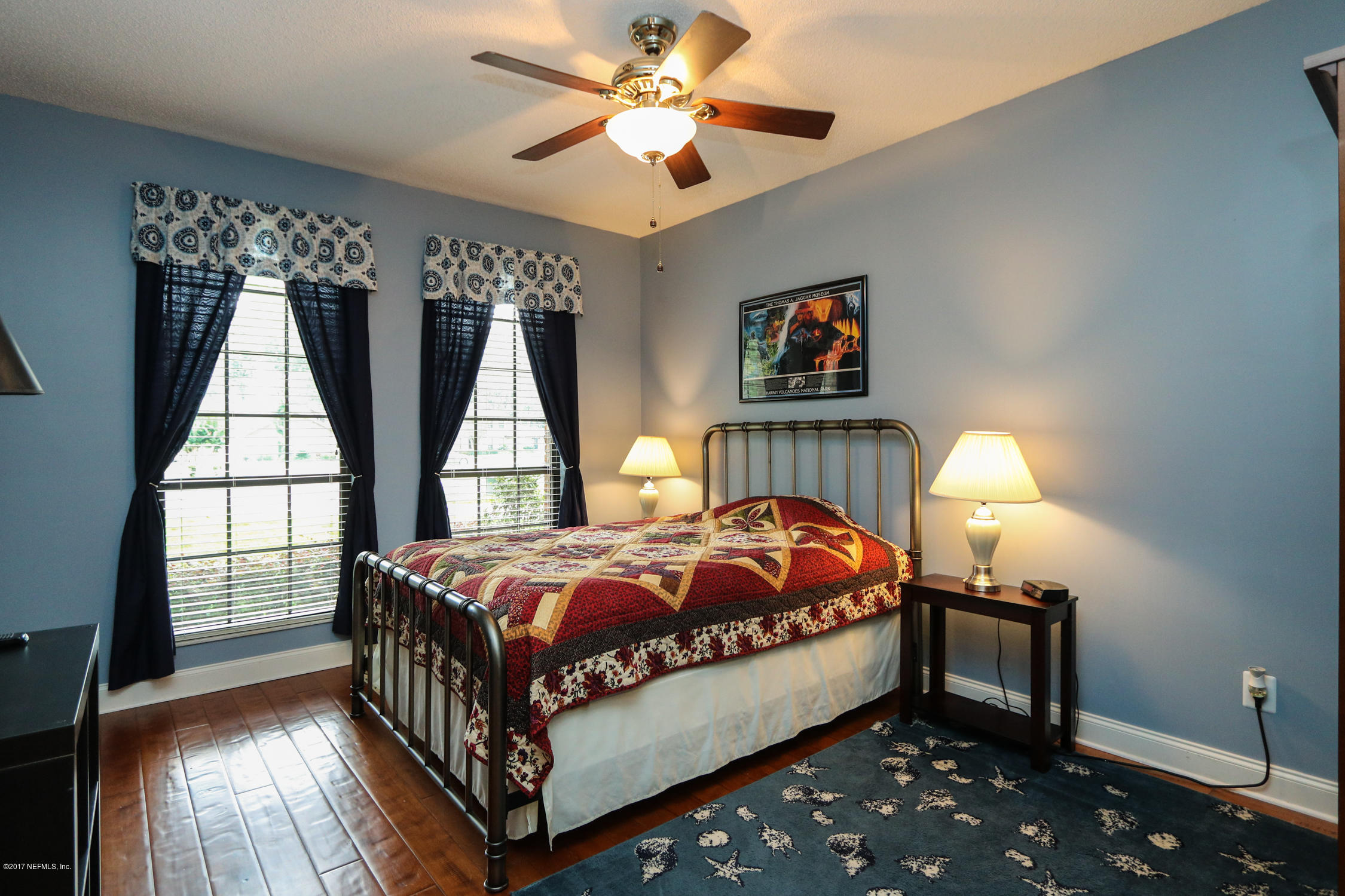 3141 Nautilus Road Middleburg, FL 32068 - Photo 32 of 43 a bed room with a bed and a window