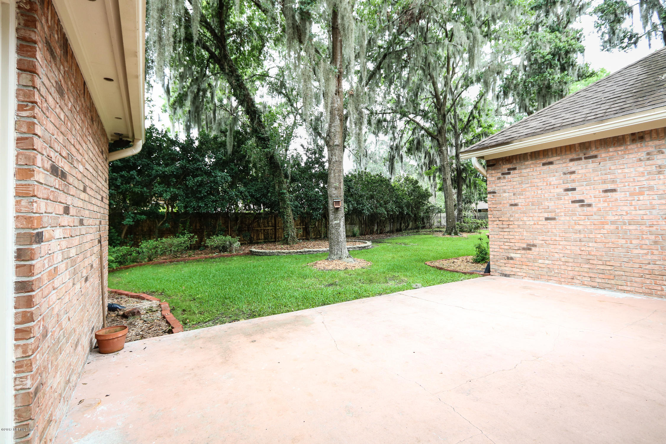 3141 Nautilus Road Middleburg, FL 32068 - Photo 36 of 43 front view of a house with a yard