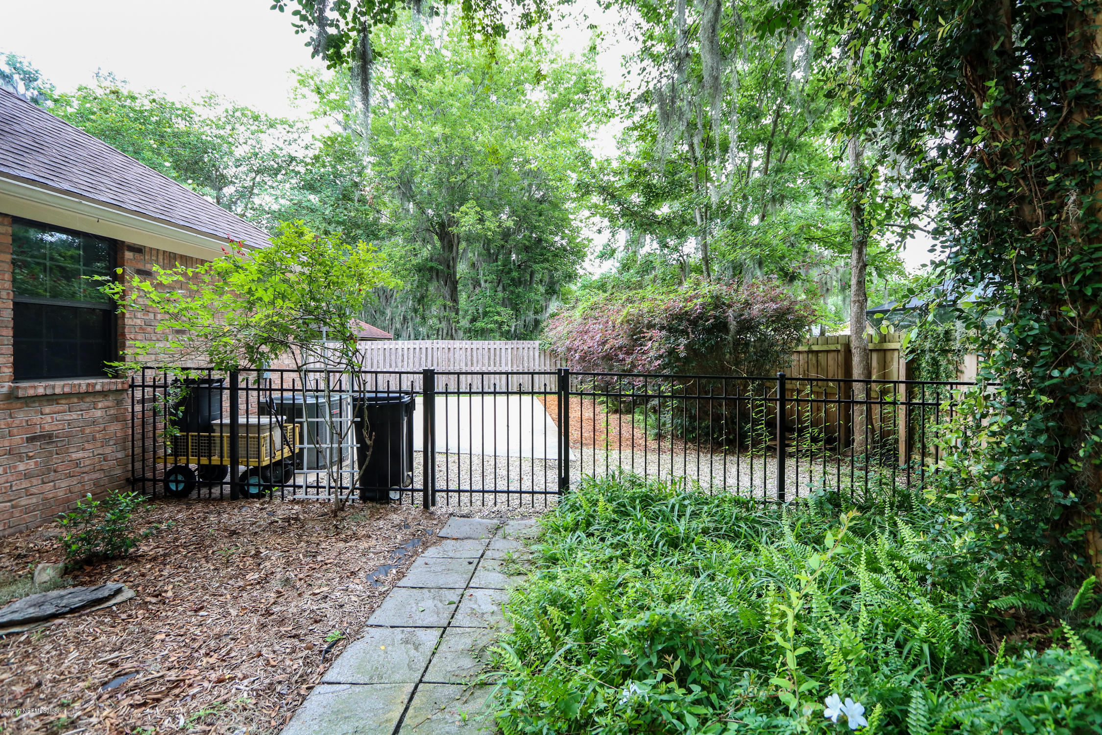 3141 Nautilus Road Middleburg, FL 32068 - Photo 42 of 43 a view of a gate and fence