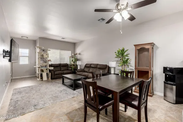 a view of a dining room with furniture