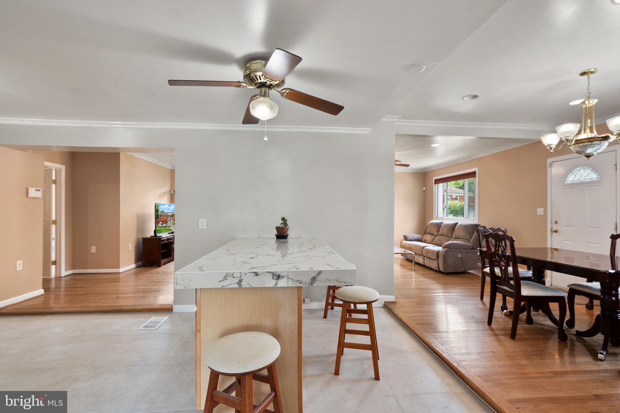 11300 Schuylkill Road Rockville, MD 20852 - Photo 11 of 55 a view of a dining room with furniture and wooden floor