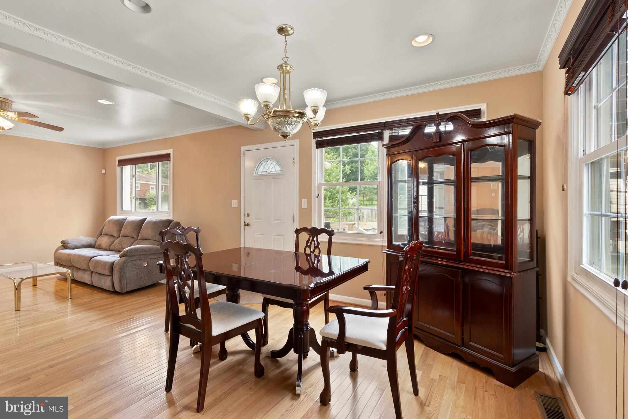11300 Schuylkill Road Rockville, MD 20852 - Photo 15 of 55 a view of a dining room with furniture window and wooden floor