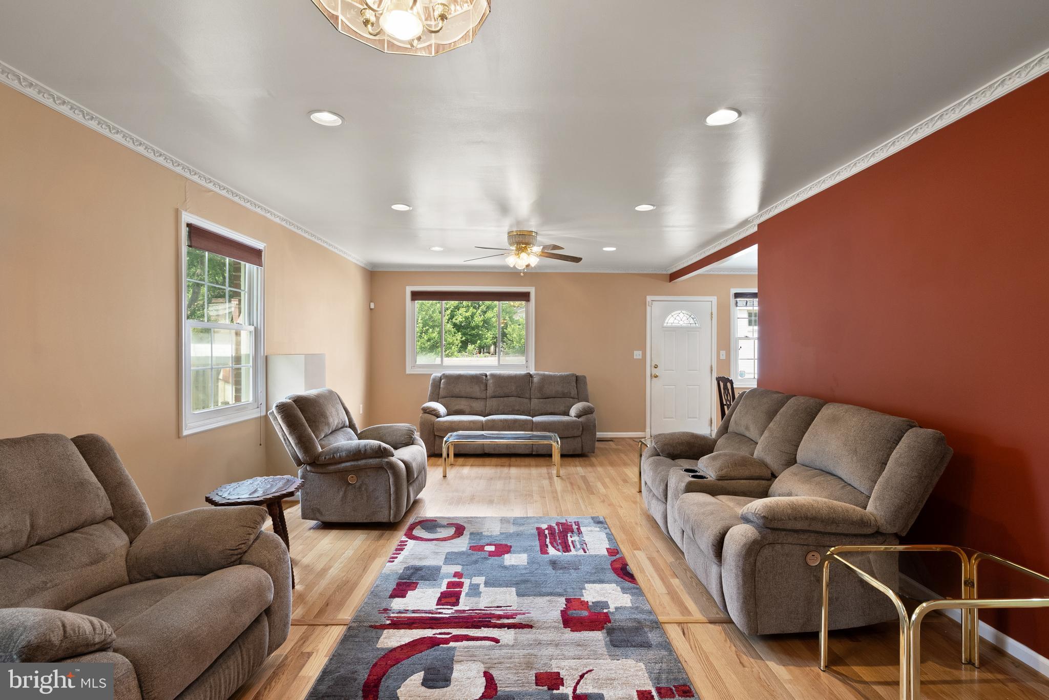 11300 Schuylkill Road Rockville, MD 20852 - Photo 16 of 55 a living room with furniture and a rug