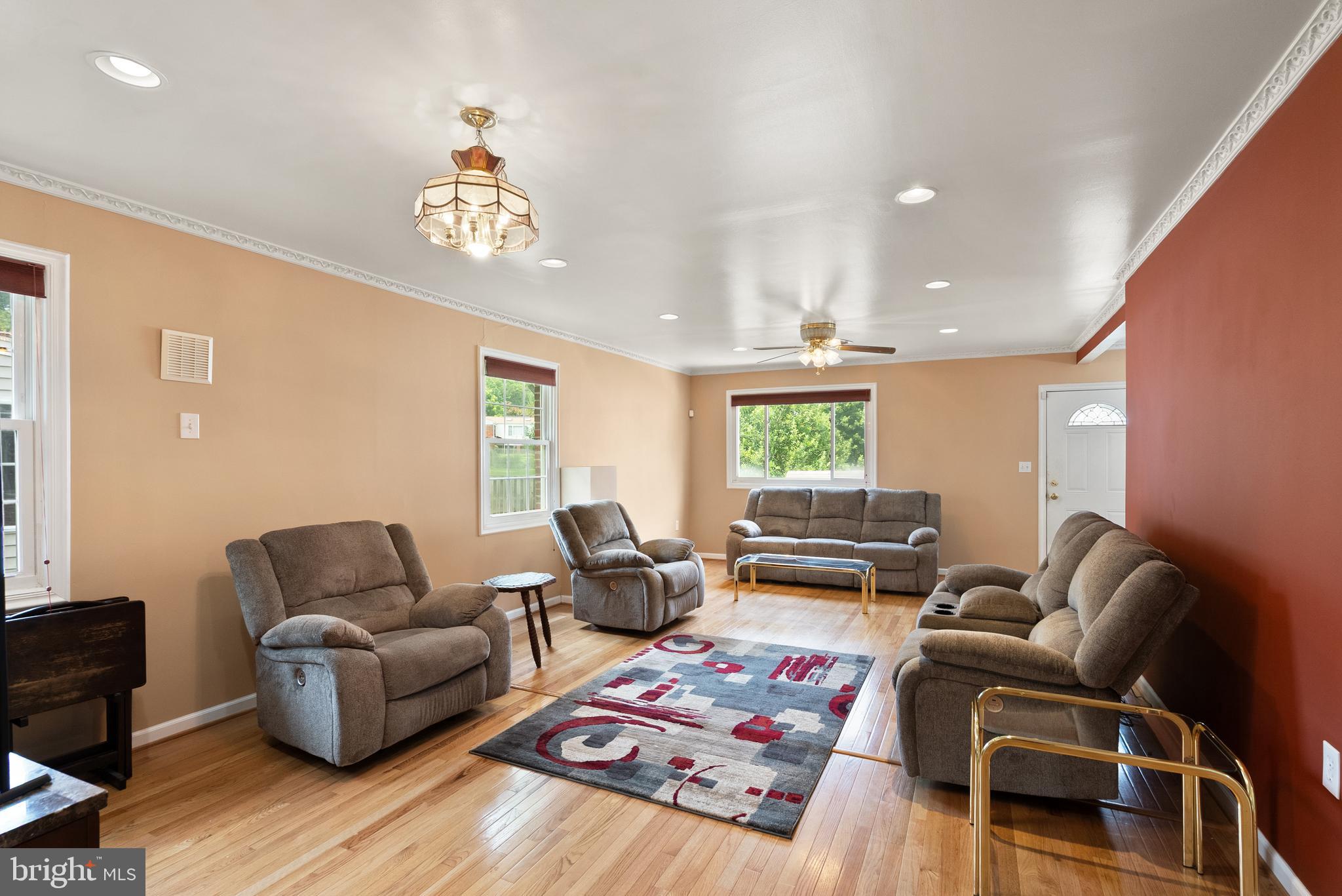 11300 Schuylkill Road Rockville, MD 20852 - Photo 17 of 55 a living room with furniture fireplace and window
