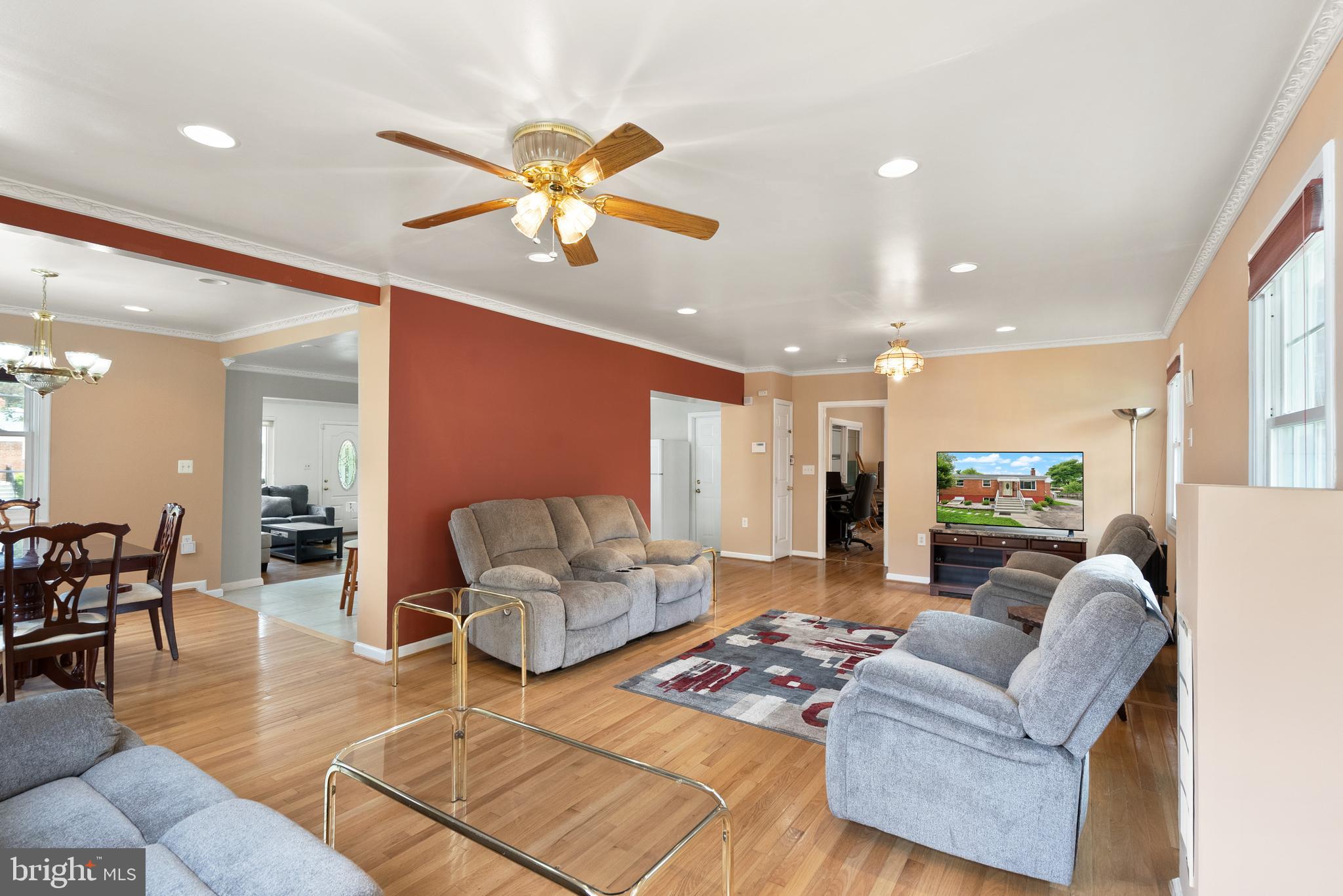 11300 Schuylkill Road Rockville, MD 20852 - Photo 20 of 55 a living room with furniture and wooden floor