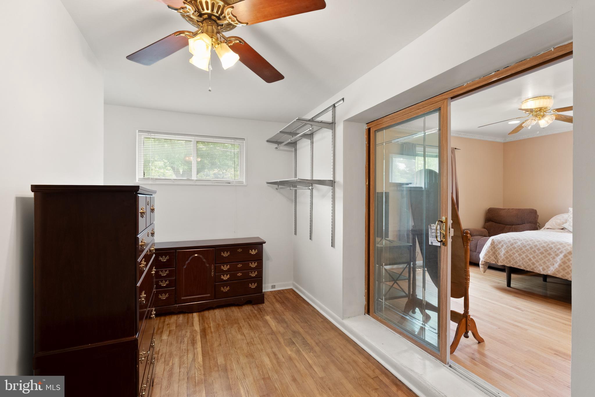 11300 Schuylkill Road Rockville, MD 20852 - Photo 25 of 55 a view of bedroom with a bed and wooden floor