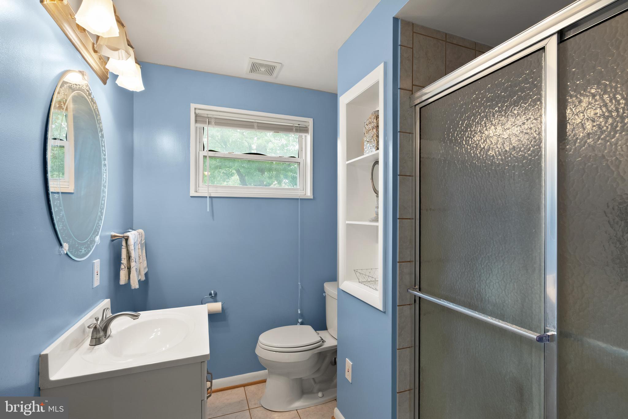 11300 Schuylkill Road Rockville, MD 20852 - Photo 29 of 55 a bathroom with a toilet sink and mirror