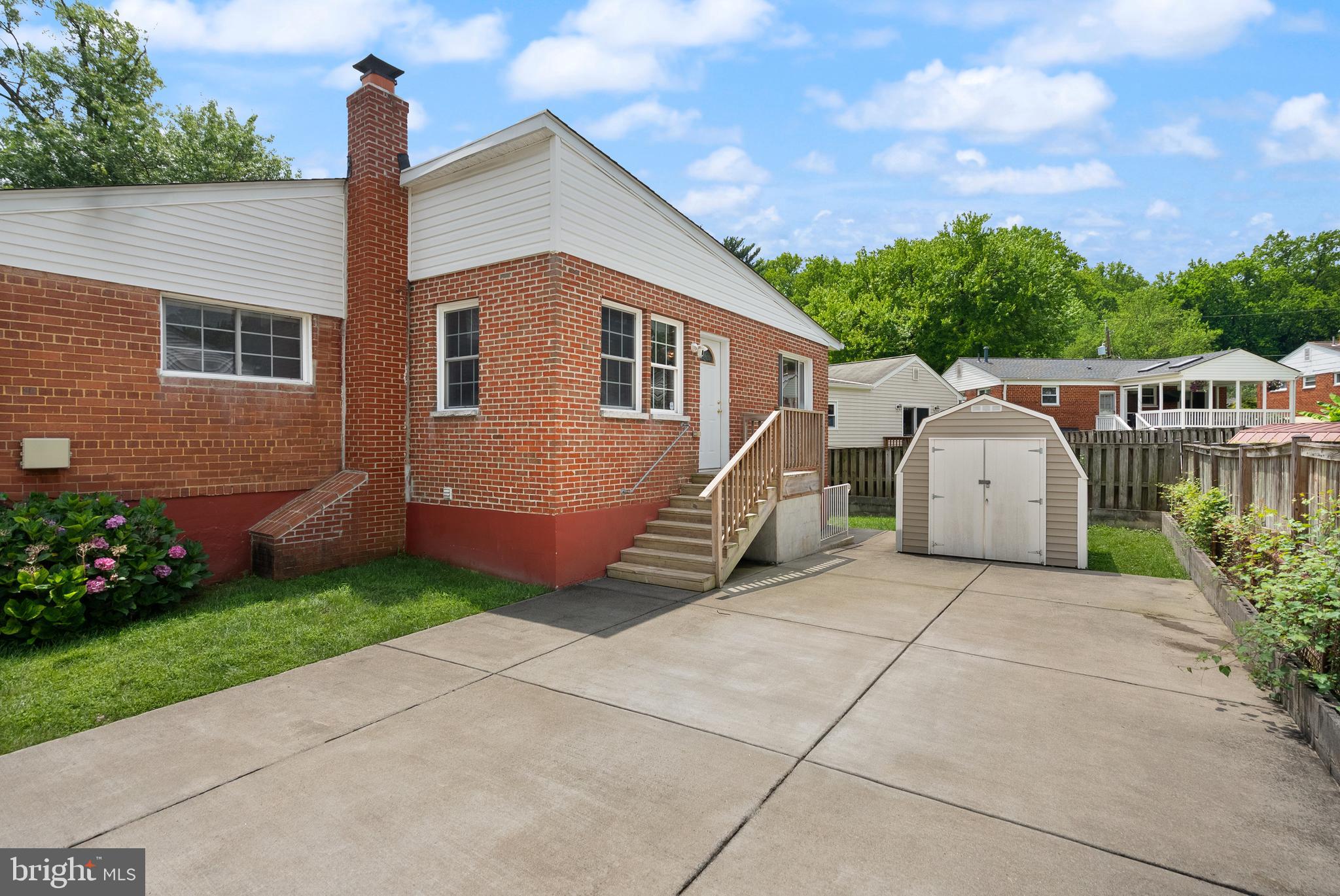 11300 Schuylkill Road Rockville, MD 20852 - Photo 3 of 55 a view of a house with a yard and plants