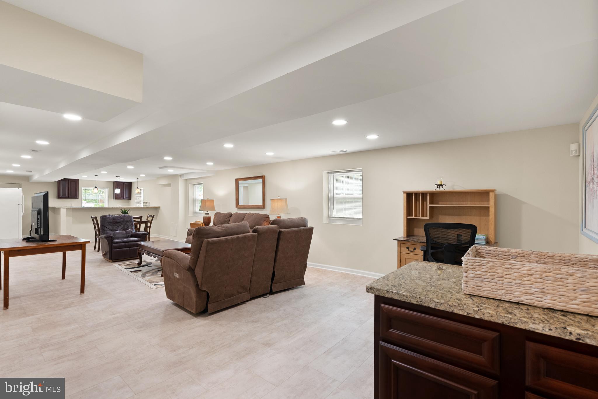 11300 Schuylkill Road Rockville, MD 20852 - Photo 40 of 55 a living room with furniture and kitchen