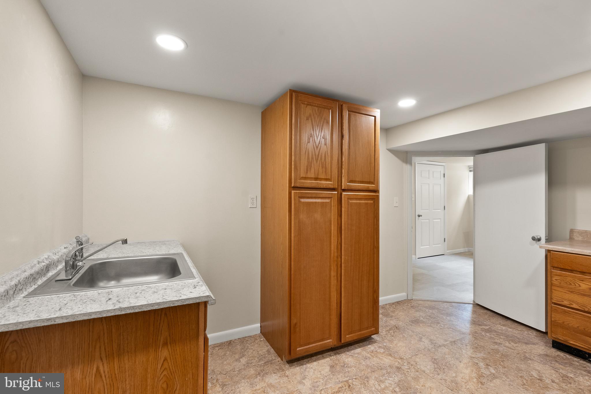 11300 Schuylkill Road Rockville, MD 20852 - Photo 49 of 55 a bathroom with a sink and a mirror