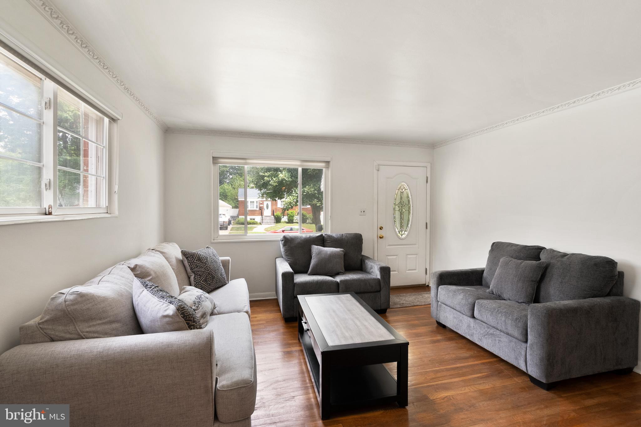 11300 Schuylkill Road Rockville, MD 20852 - Photo 5 of 55 a living room with furniture and a window