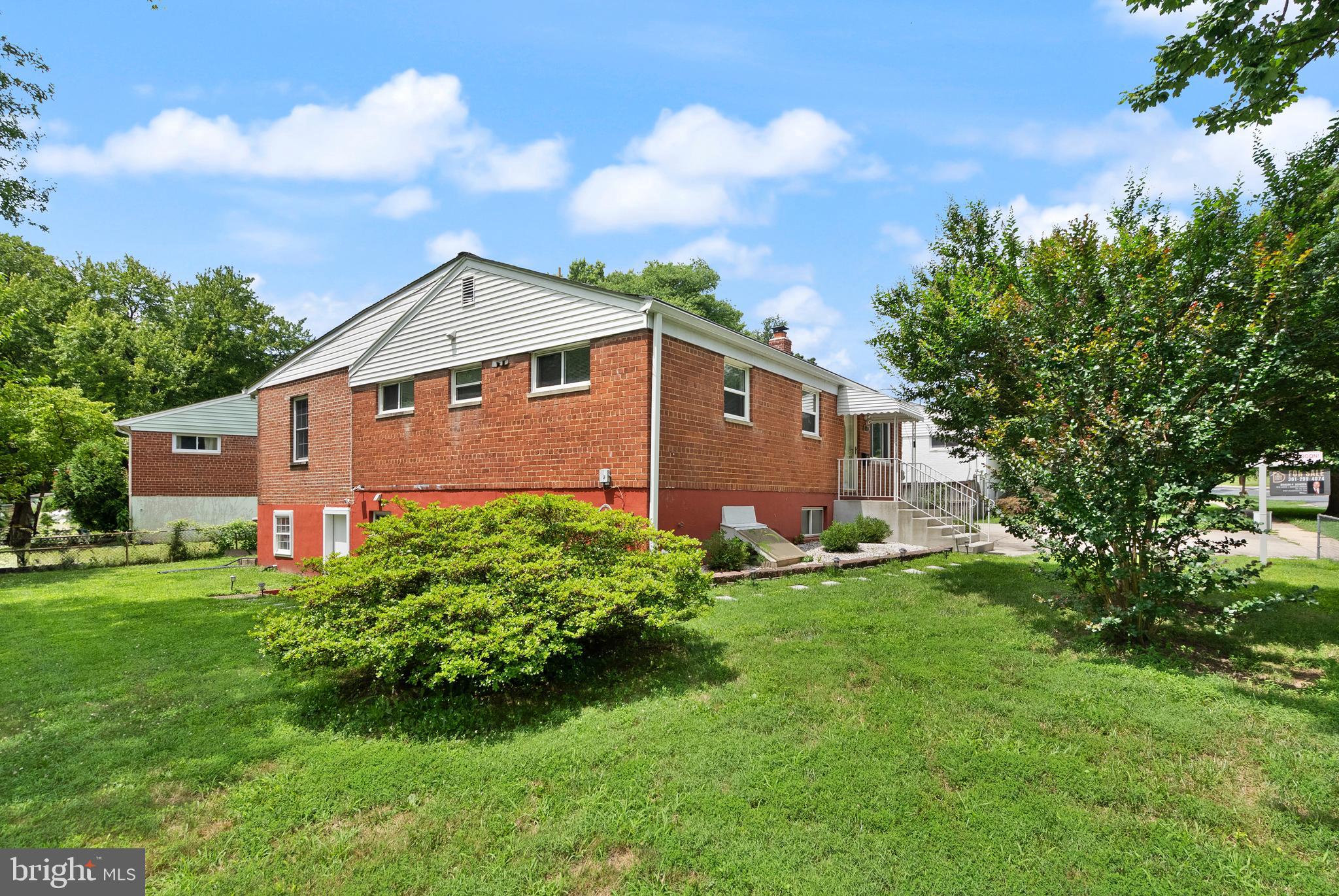11300 Schuylkill Road Rockville, MD 20852 - Photo 51 of 55 a front view of a house with garden