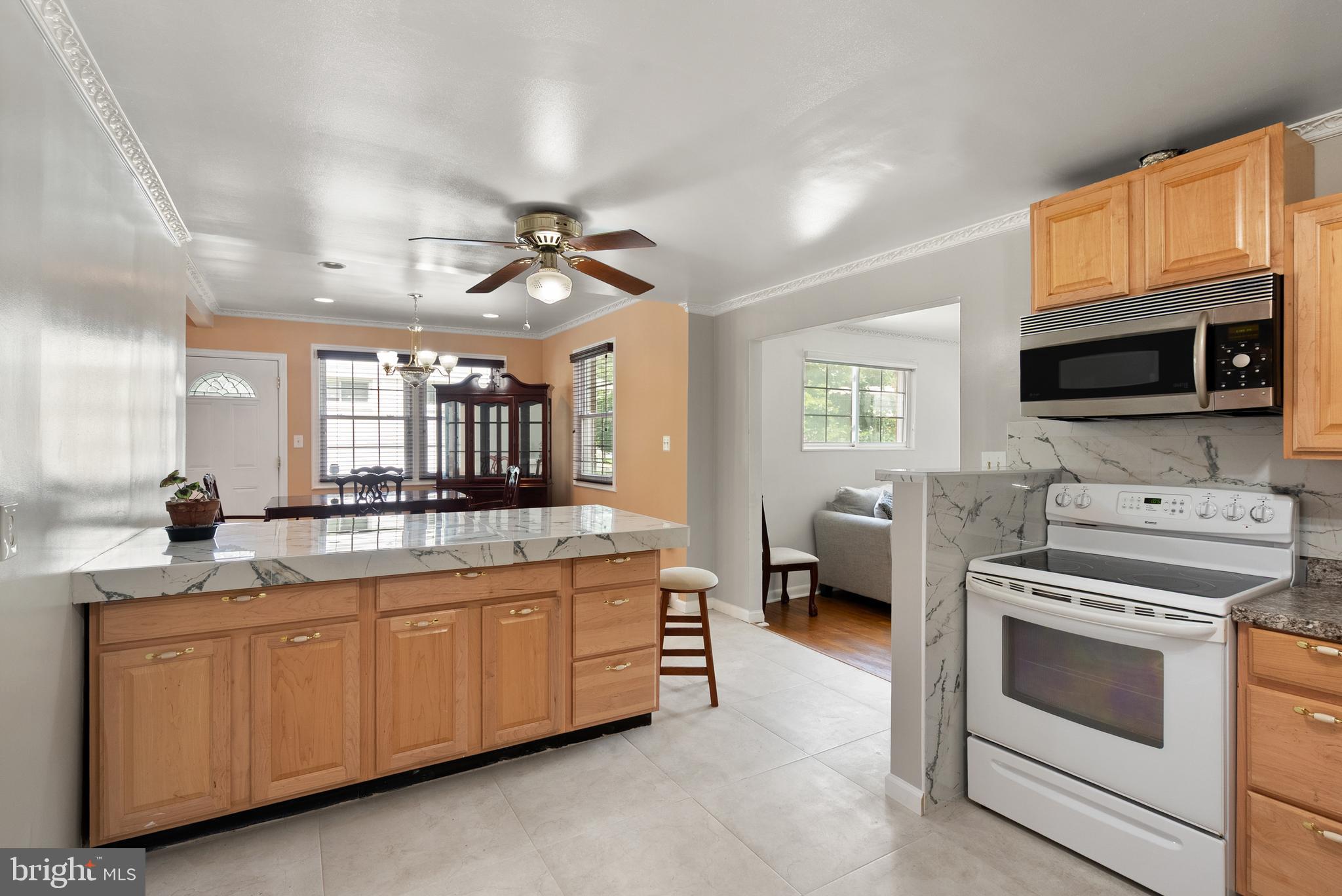 11300 Schuylkill Road Rockville, MD 20852 - Photo 9 of 55 a kitchen with a stove and a sink