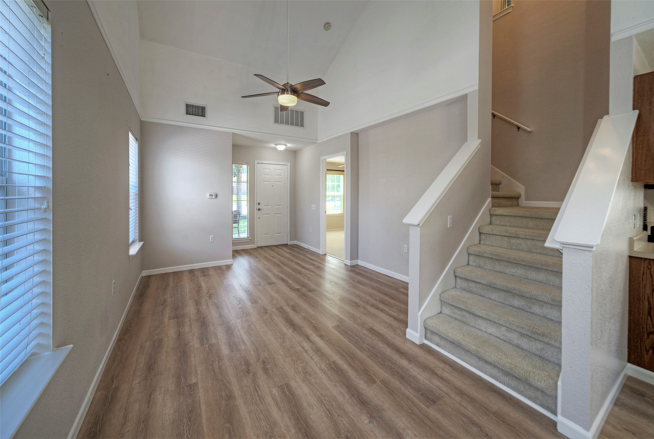 18100 Belfry Pass Manor, TX 78653 - Photo 17 of 30 a view of entryway and hall with wooden floor