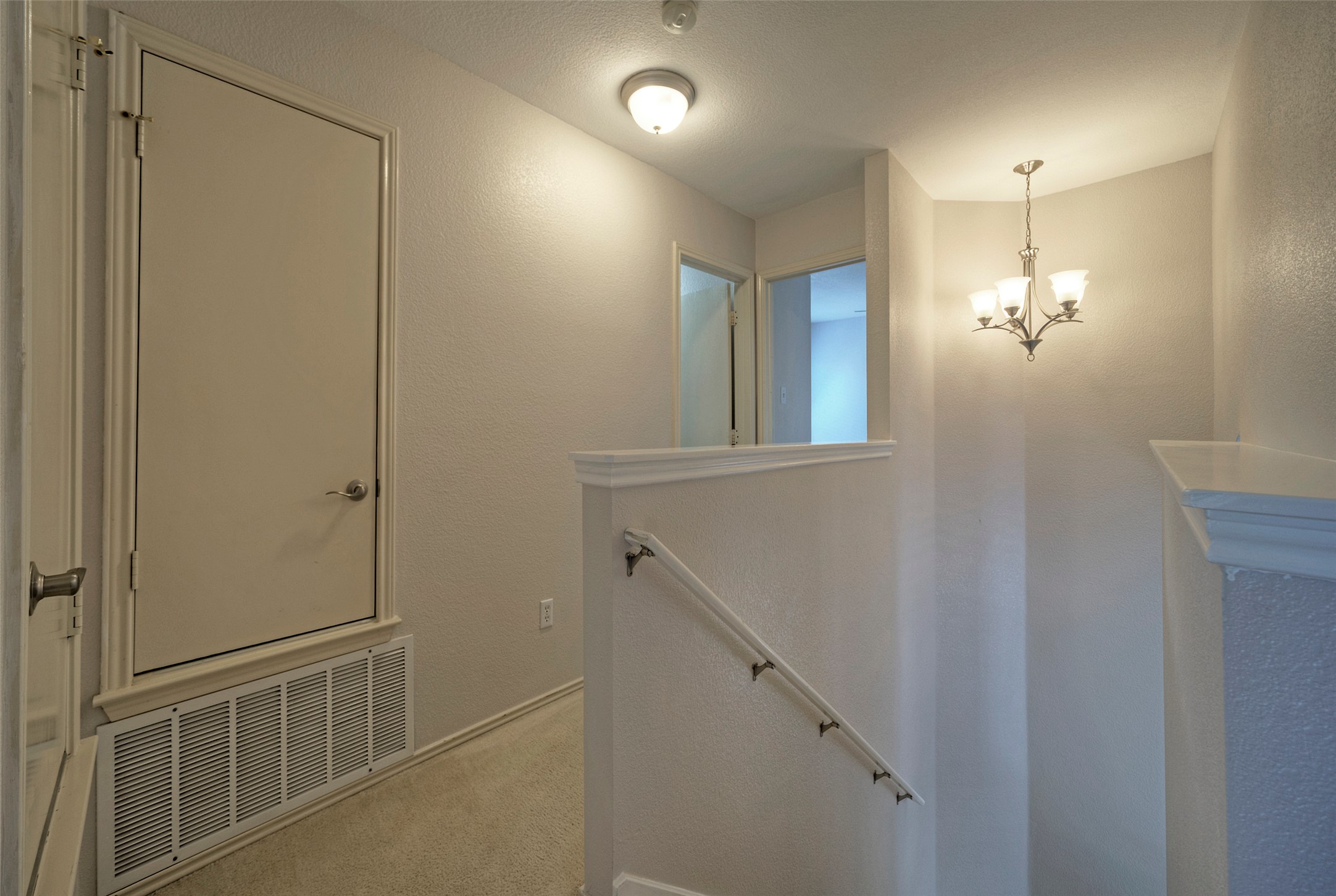 18100 Belfry Pass Manor, TX 78653 - Photo 18 of 30 a view of an entryway with wooden floor