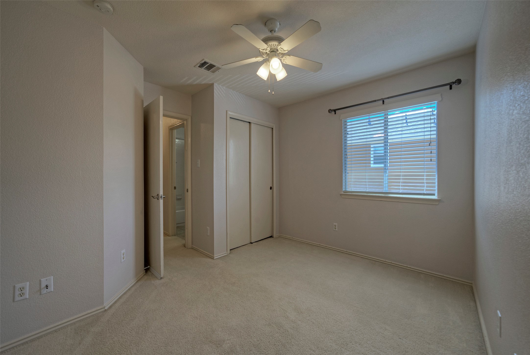 18100 Belfry Pass Manor, TX 78653 - Photo 20 of 30 a view of an empty room with a window