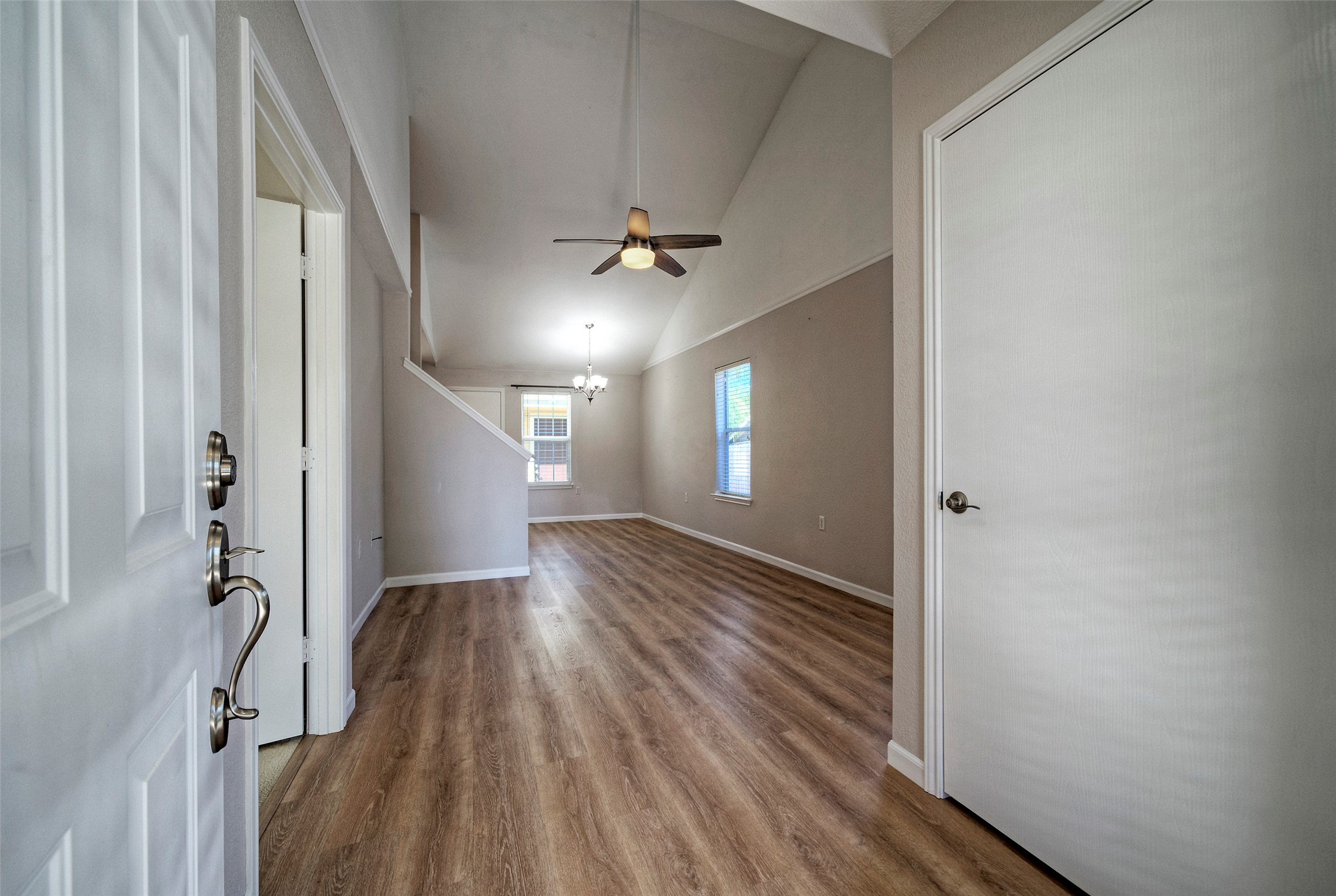18100 Belfry Pass Manor, TX 78653 - Photo 3 of 30 wooden floor in an empty room with a window
