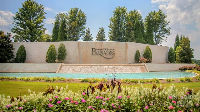 a view of swimming pool with a garden