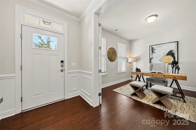 a view of a living room and dining room