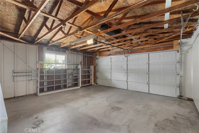 a view of a room with wooden walls