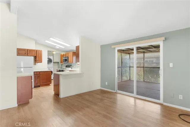 a view of kitchen with wooden floor