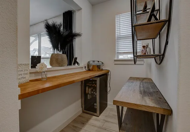 a bathroom with a sink toilet and mirror