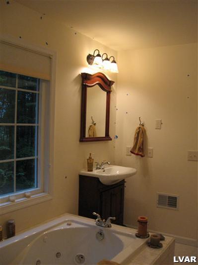 2 Long Mountain Road Effort, PA 18330 - Photo 11 of 12 a bathroom with a sink and a bathtub