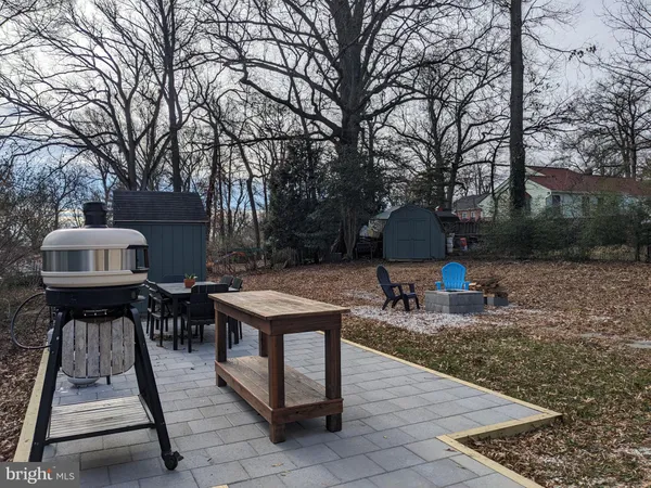 a view of backyard with seating space