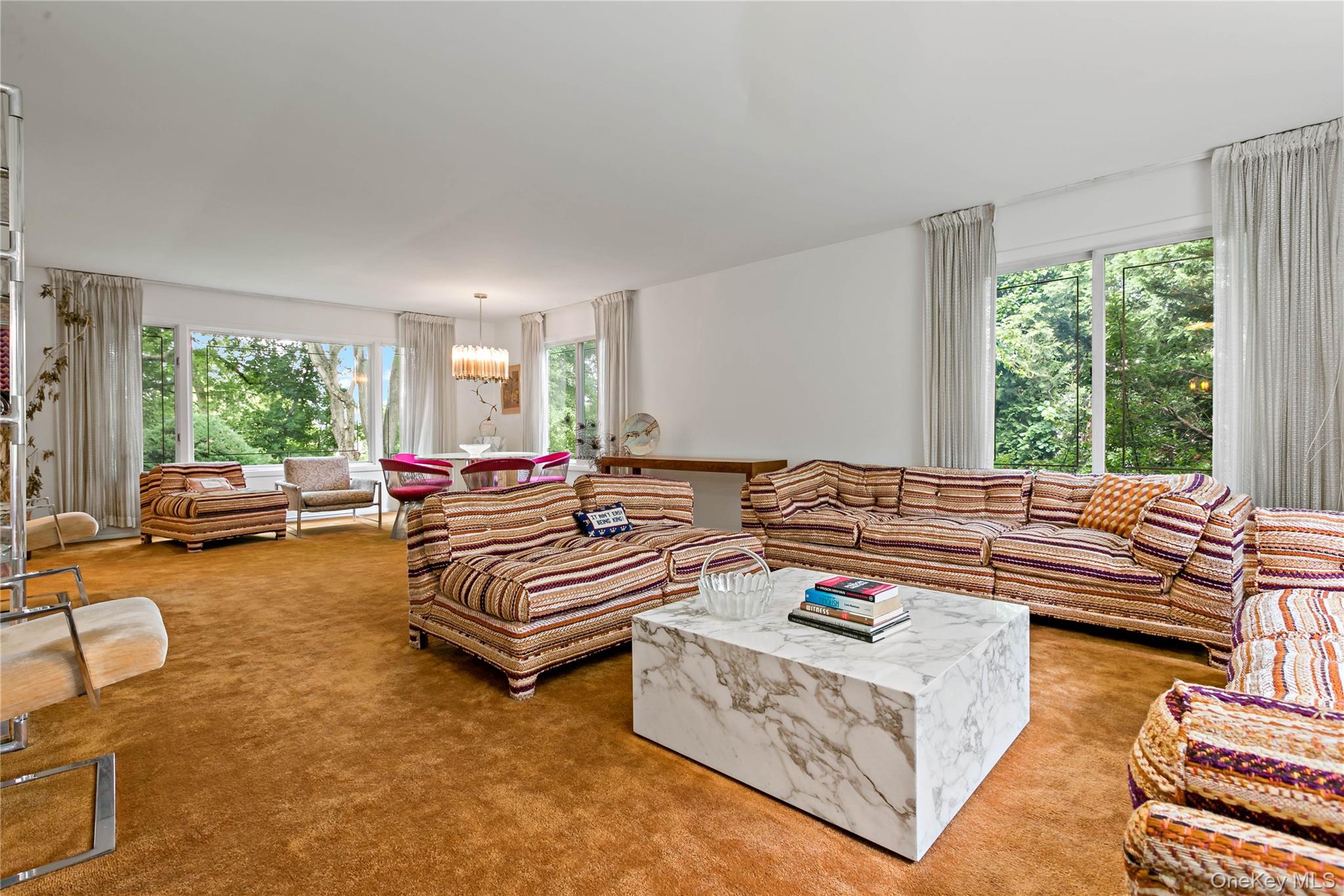 16 Meadow Road Scarsdale, NY 10583 - Photo 4 of 47 a living room with furniture and a large window