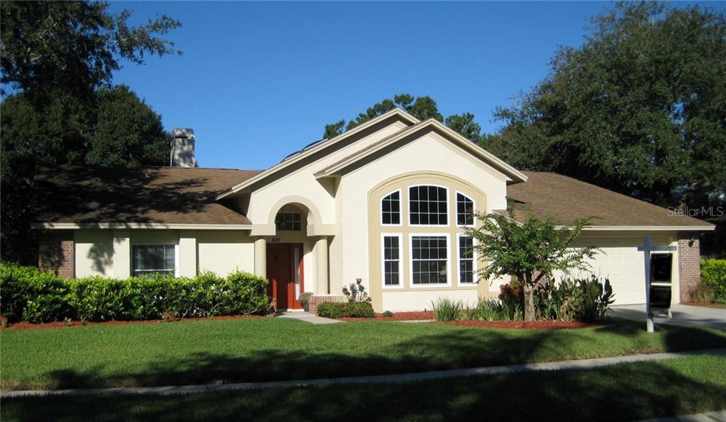 8412 Ridgebrook Circle Odessa, FL 33556 - Photo 1 of 1 a front view of a house with a yard