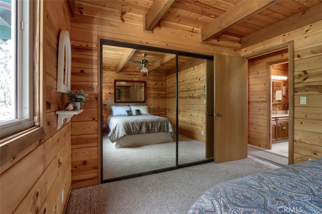 5027 Fox Creek Road Mariposa, CA 95338 - Photo 19 of 75 a bedroom with a large bed and a large window