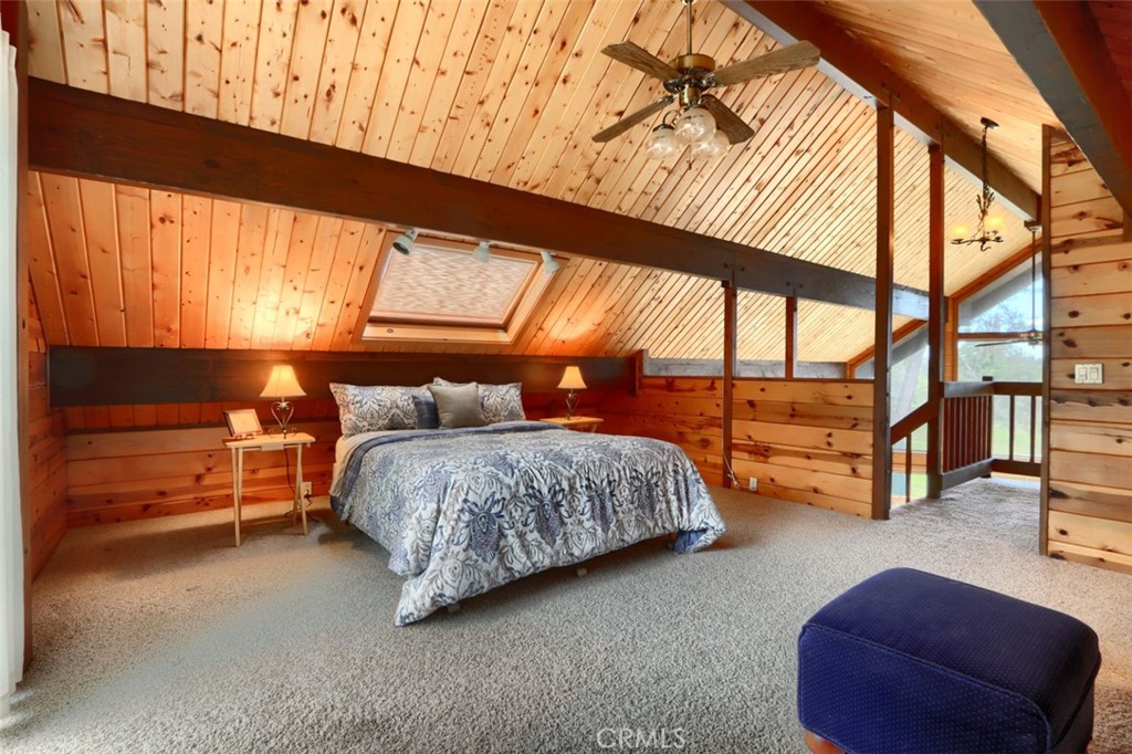 5027 Fox Creek Road Mariposa, CA 95338 - Photo 33 of 75 a bed room with a bed and a chair