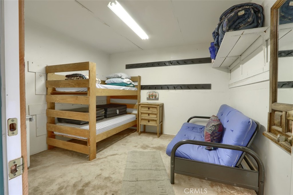 5027 Fox Creek Road Mariposa, CA 95338 - Photo 56 of 75 a bed room with a bed and a chair