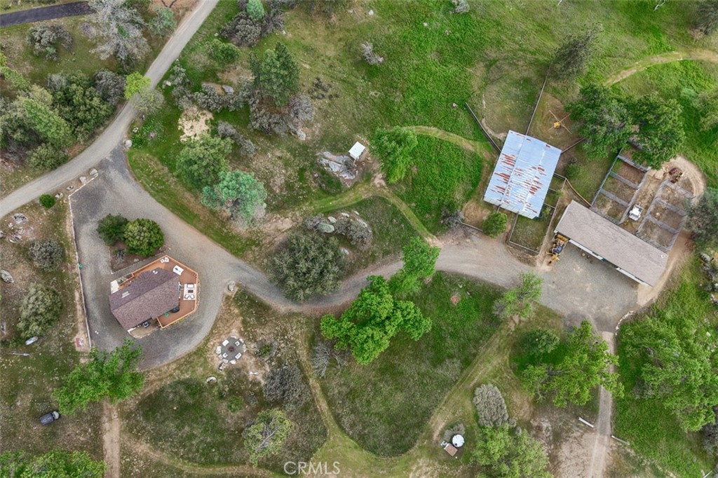 5027 Fox Creek Road Mariposa, CA 95338 - Photo 73 of 75 an aerial view of a house with a yard and lake view