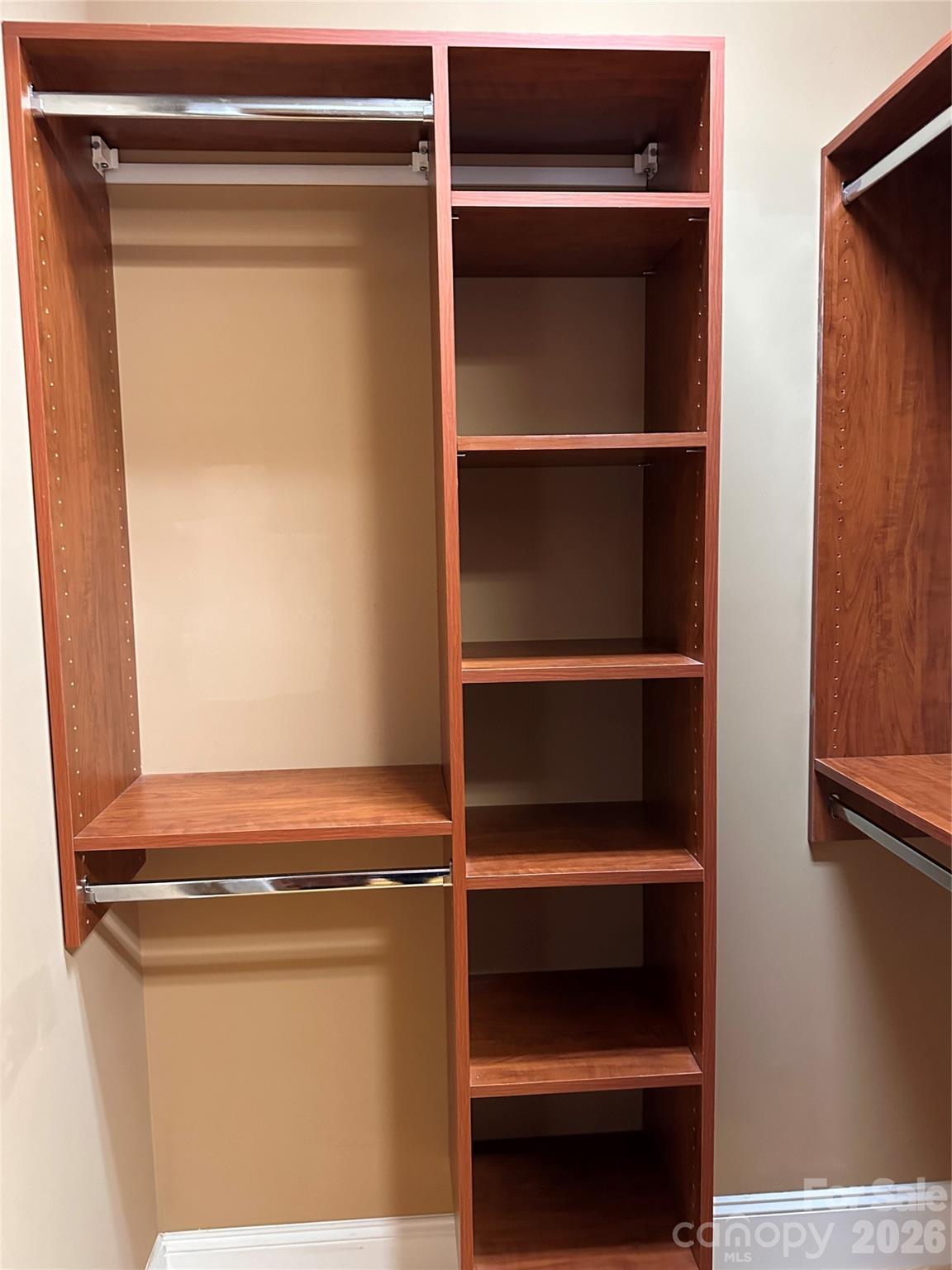 26 Stone House Road Arden, NC 28704 - Photo 19 of 21 a view of walk in closet with empty racks