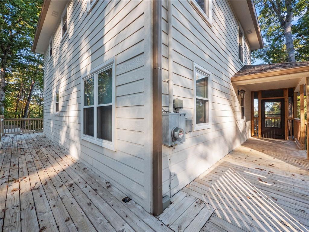6185 Timberidge Drive Gainesville, GA 30506 - Photo 17 of 50 a view of a house with a door and wooden floor