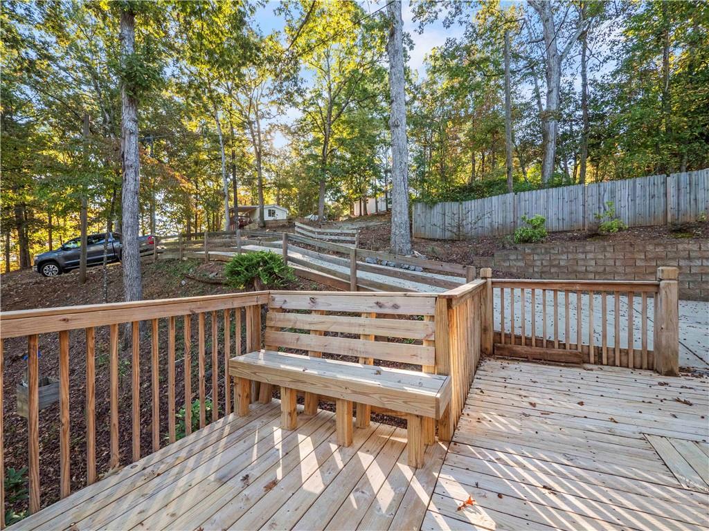 6185 Timberidge Drive Gainesville, GA 30506 - Photo 18 of 50 a view of outdoor space with deck and a garden