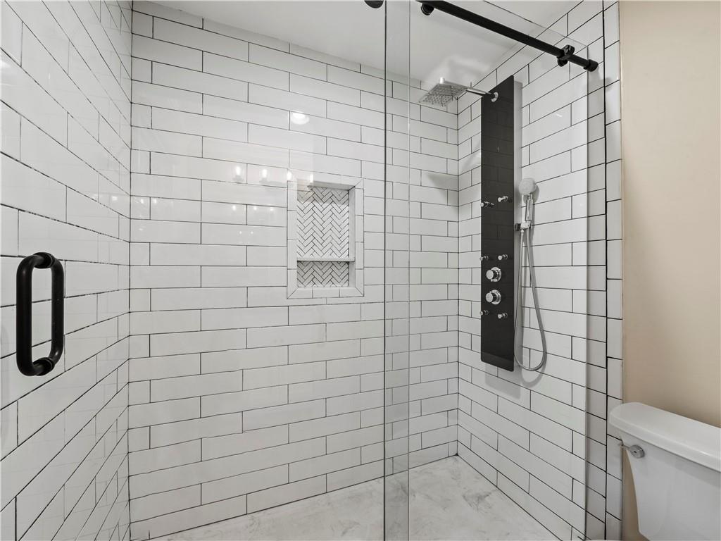 6185 Timberidge Drive Gainesville, GA 30506 - Photo 39 of 50 a bathroom with a shower
