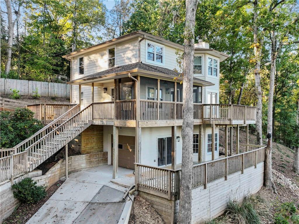 6185 Timberidge Drive Gainesville, GA 30506 - Photo 4 of 50 a front view of a house with balcony
