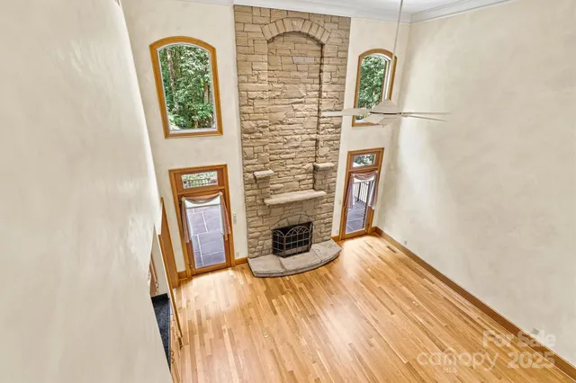 a view of front door with wooden floor