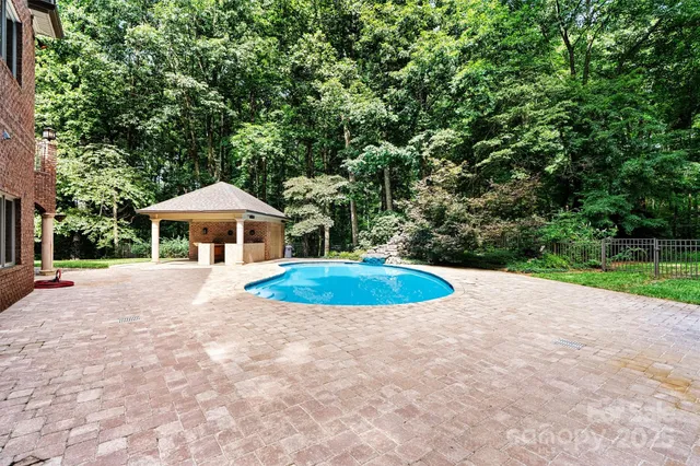 a front view of a house with yard