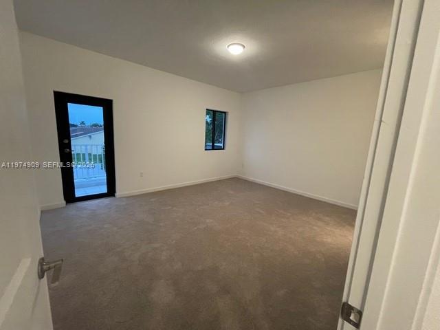 25308 Southwest 135th Avenue Homestead, FL 33032 - Photo 13 of 25 an empty room with windows