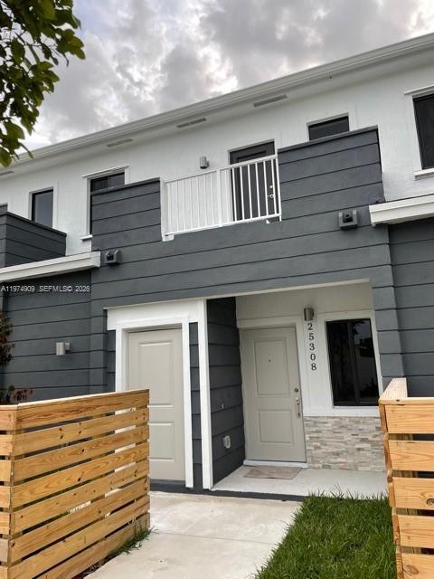 25308 Southwest 135th Avenue Homestead, FL 33032 - Photo 2 of 25 a view of front door of house