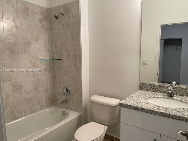 25308 Southwest 135th Avenue Homestead, FL 33032 - Photo 7 of 25 a bathroom with a granite countertop sink toilet and shower