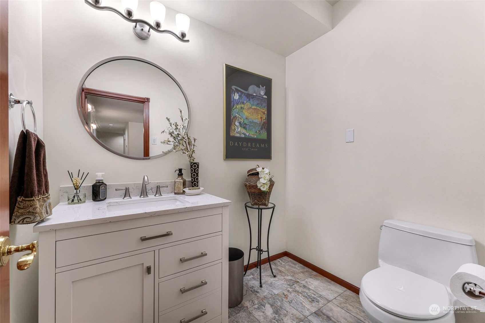 2756 Brown Road Ferndale, WA 98248 - Photo 15 of 35 a bathroom with a toilet sink vanity and mirror